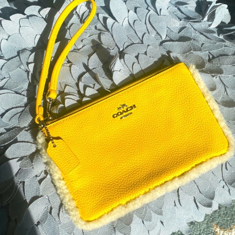 NWOT Coach RARE Electric Yellow Wristlet pebble leather with shearling trim